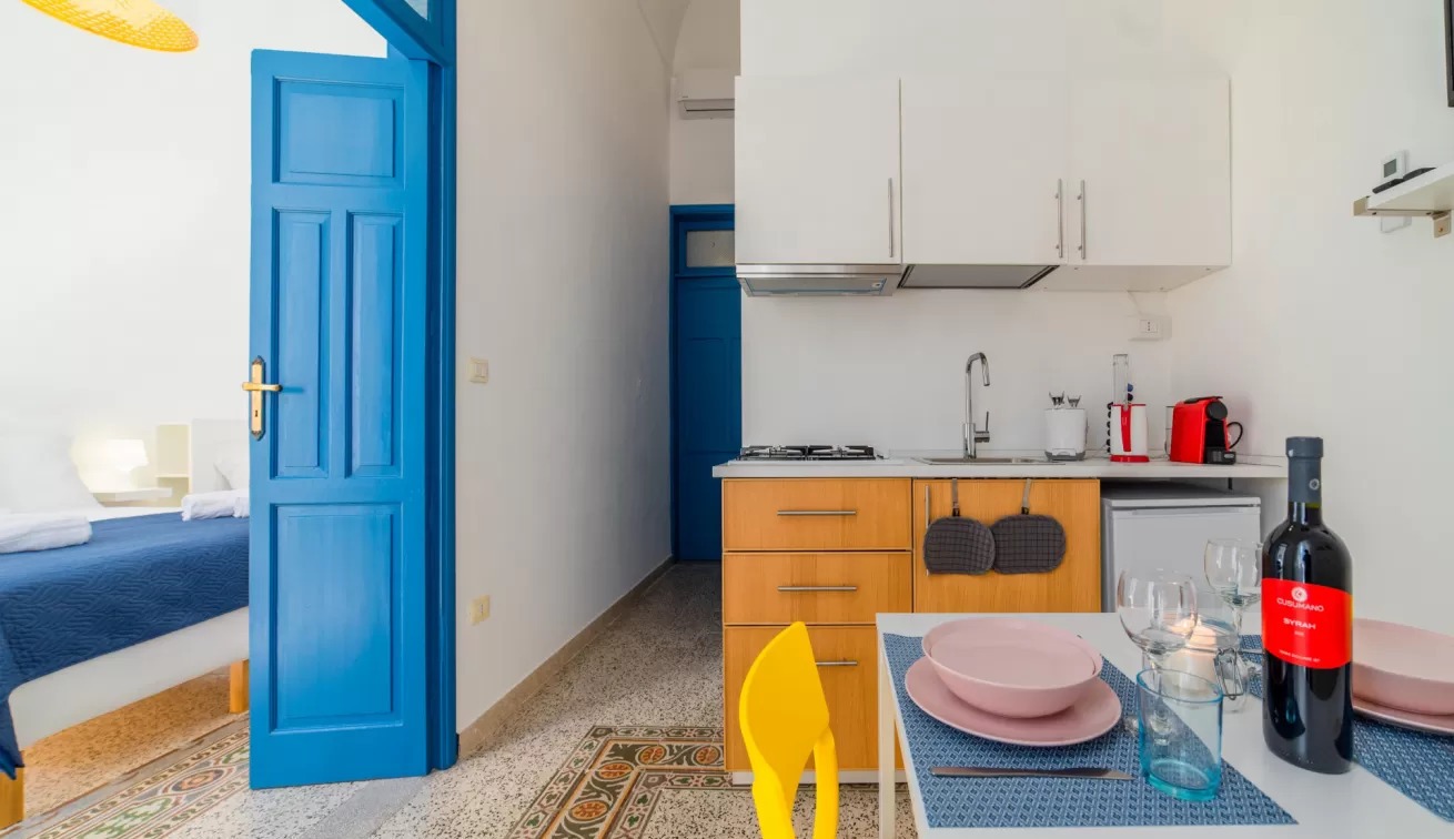 le 4 perle apartments cucina appartamento Giulia