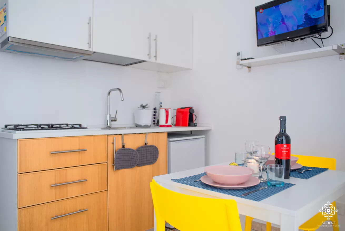 le 4 perle apartments cucina appartamento Giulia