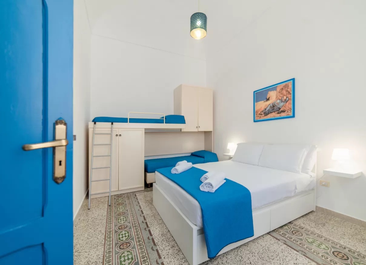le 4 perle apartments letto appartamento vittoria