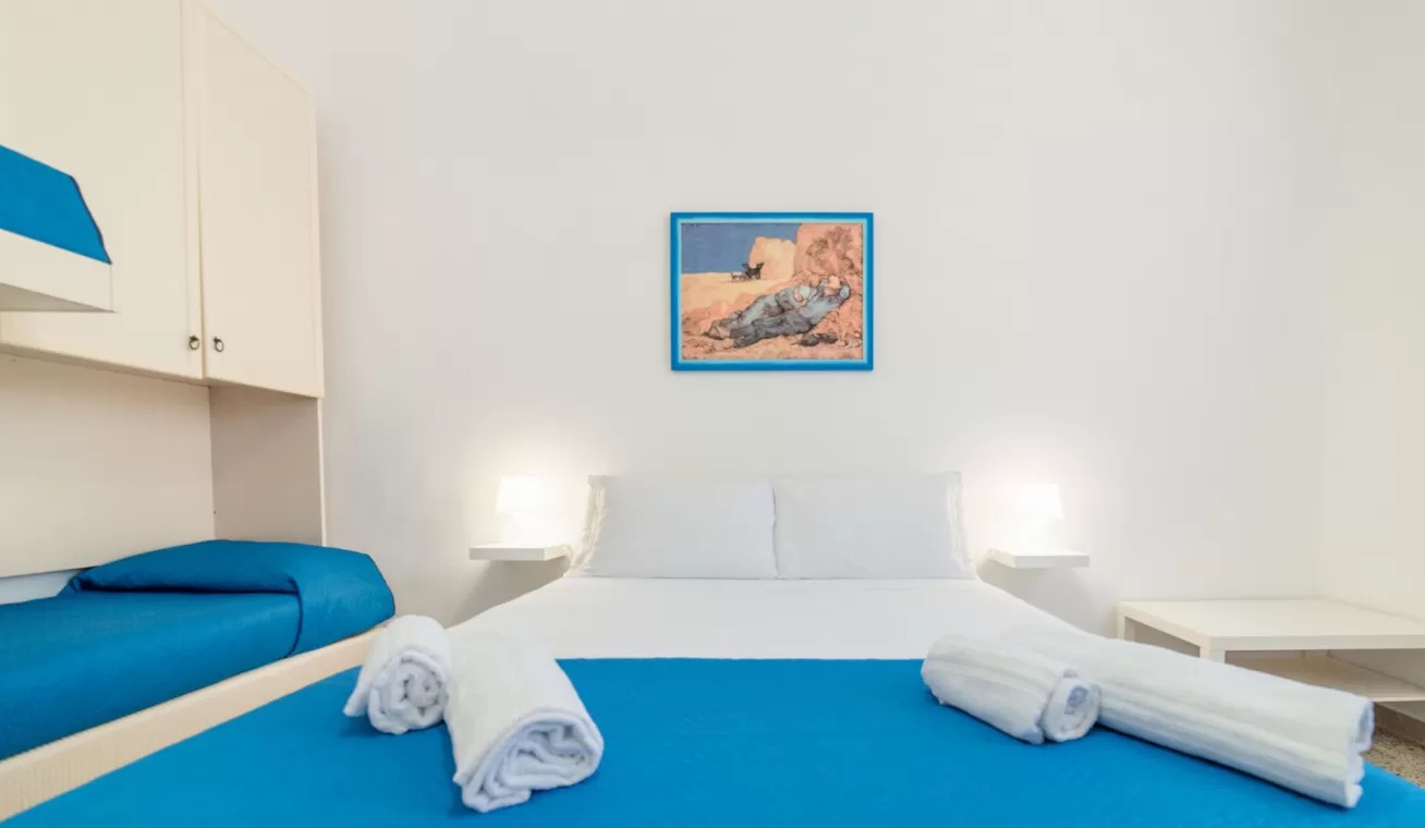 le 4 perle apartments letto appartamento vittoria