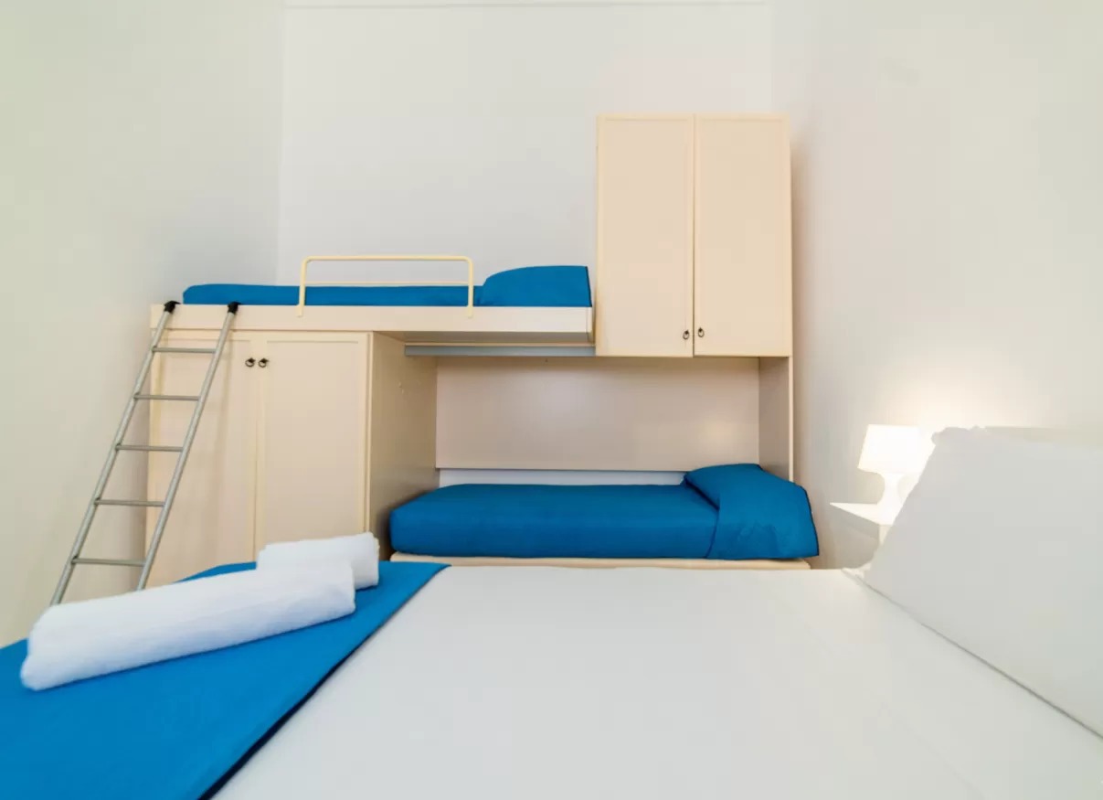 le 4 perle apartments letto appartamento vittoria